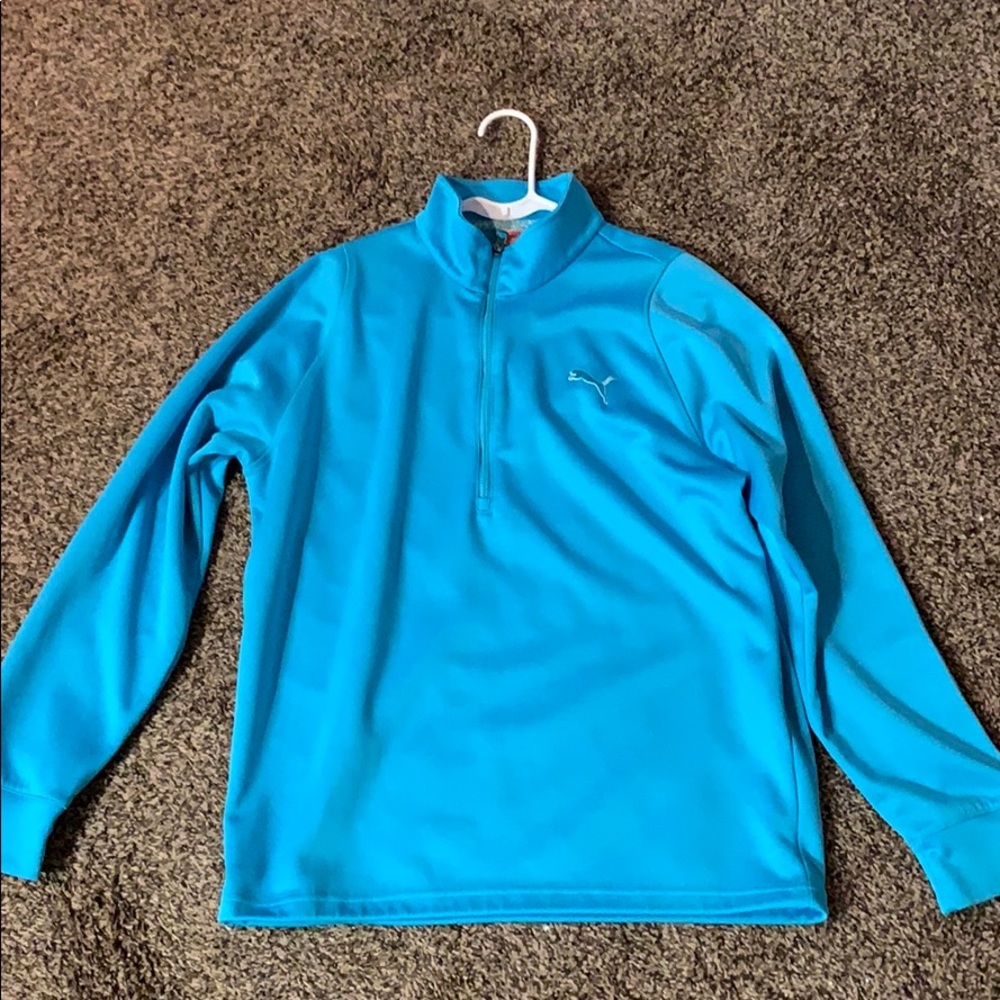 Men’s Puma golf pullover.